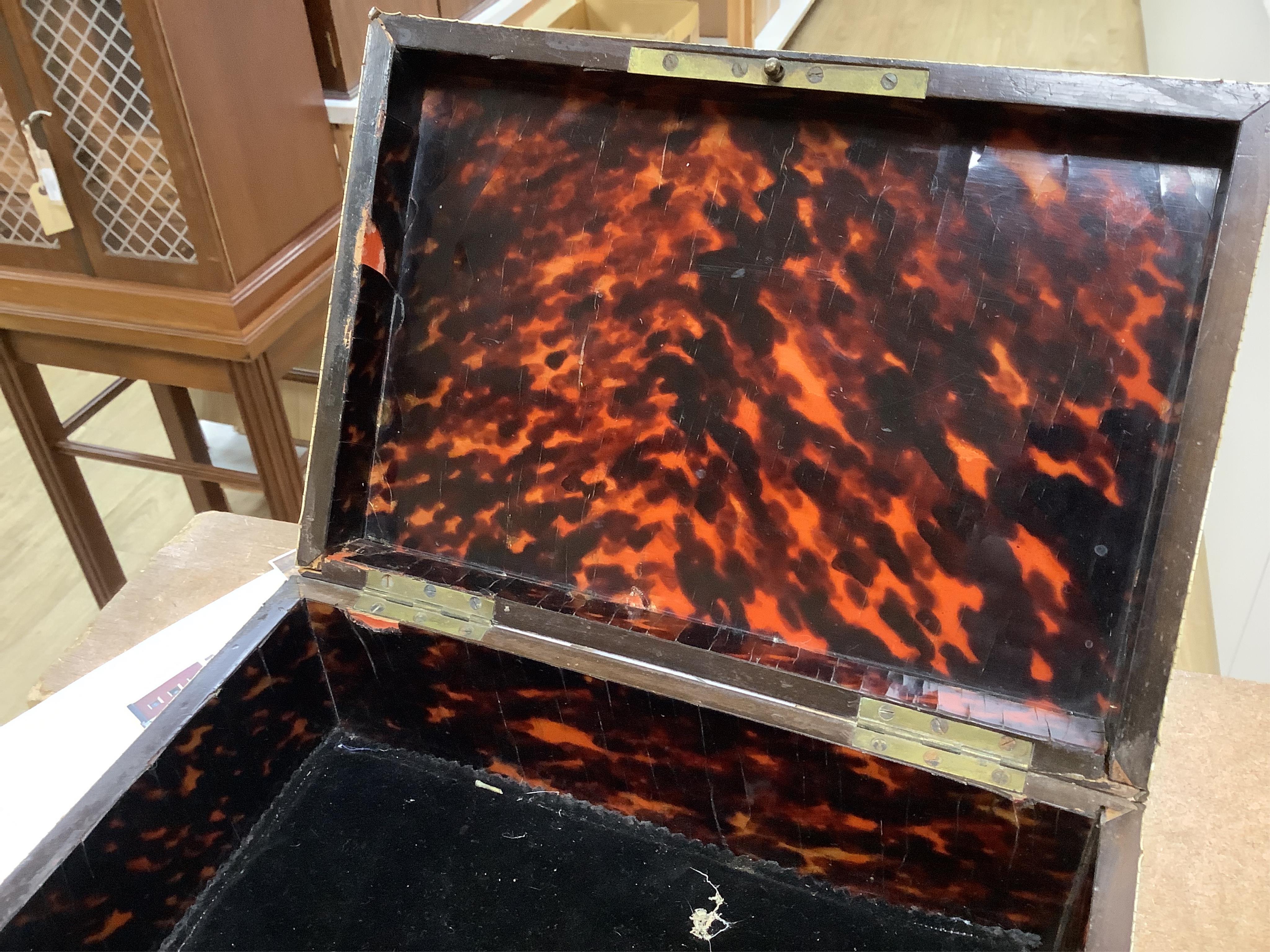 A 19th-century French tortoiseshell and faux lacquer work box, 24.5cm wide x 11.5cm high. Condition - poor to fair